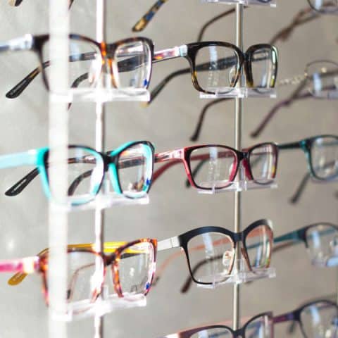 Photo of frame board full of various colored frames.